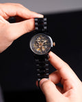 Franklord Mechanis Skeleton Watch held in hand showing full dial and strap