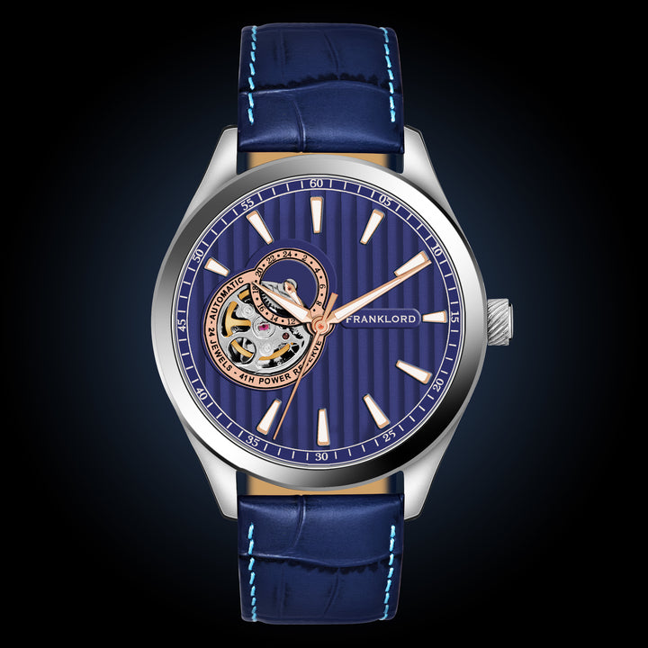 Front face of the Regal Sapphire Mechanic's Eye - Ocean Crest, highlighting its intricate blue dial and open mechanism under the Mechanic's Eye collection.