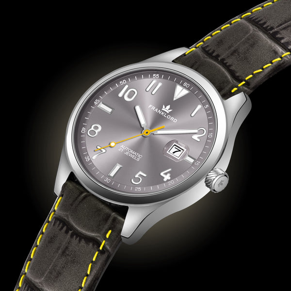 Regal Sapphire - Steel Blaze luxury automatic watch with gray dial and vibrant yellow details.